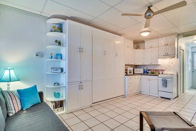 kitchen with under cabinet range hood, white appliances, a ceiling fan, white cabinets, and open shelves