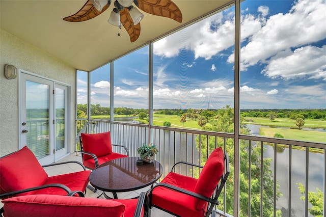 sunroom / solarium with ceiling fan