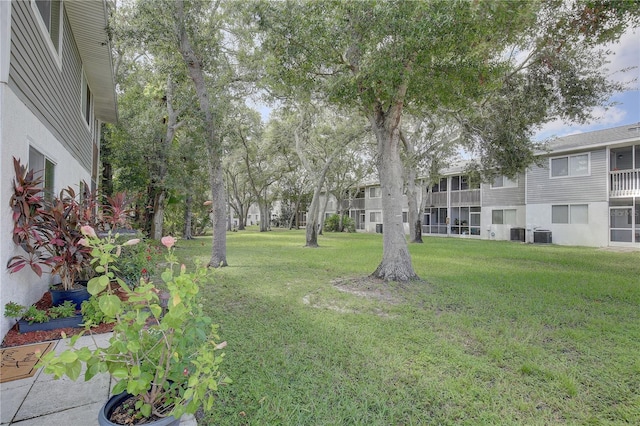 view of yard featuring central AC