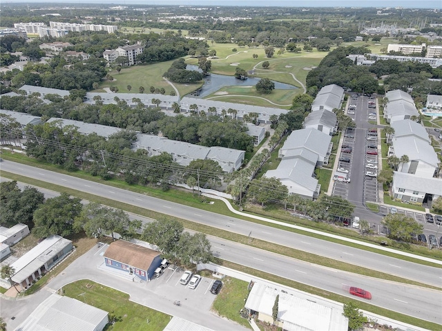 birds eye view of property with a water view and a residential view