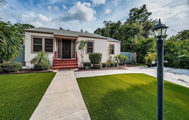 view of front of house with a front yard