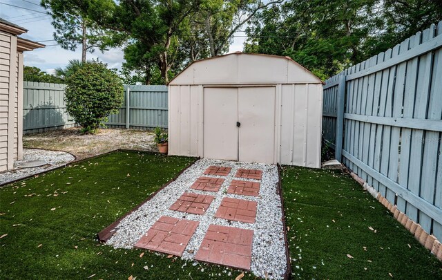 view of outdoor structure featuring a yard