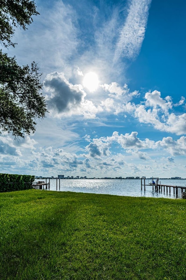 view of water feature with a dock