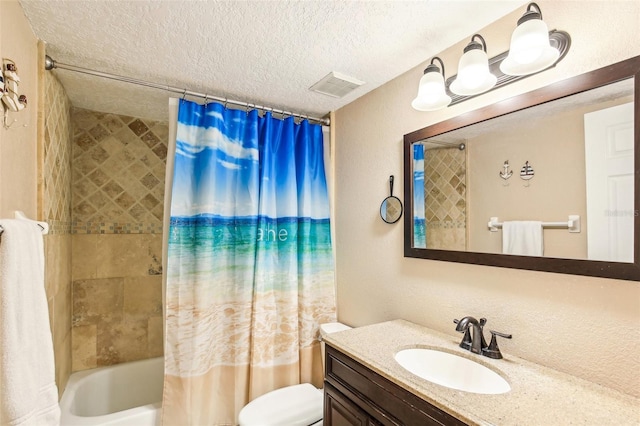 bathroom featuring a textured ceiling, toilet, vanity, visible vents, and shower / bath combination with curtain