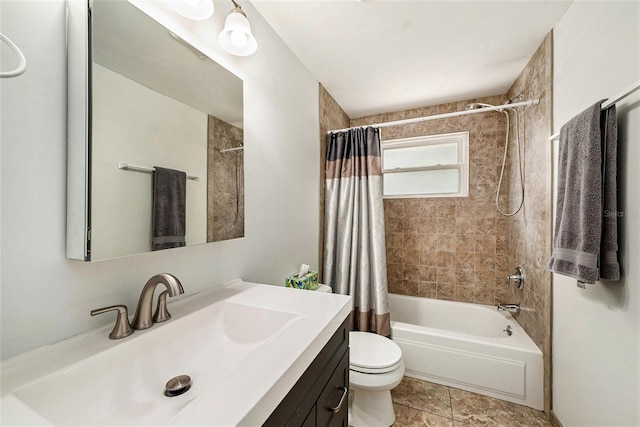 full bathroom with shower / bath combination with curtain, vanity, and toilet