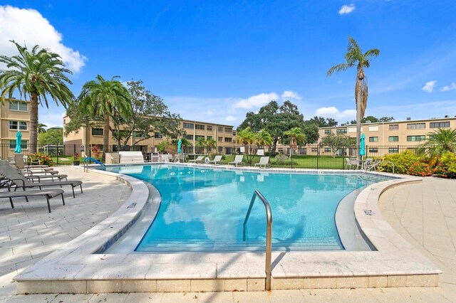 view of pool featuring a patio