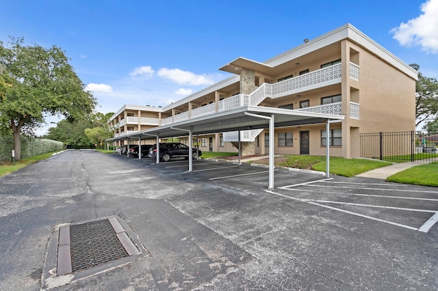 exterior space featuring a carport