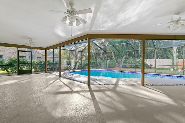 view of swimming pool featuring ceiling fan