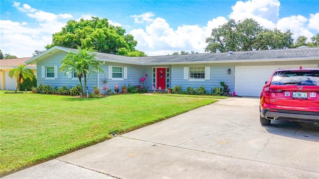 ranch-style home with a garage, concrete driveway, and a front yard