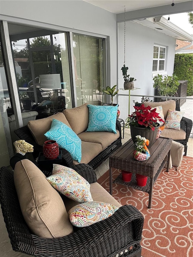 balcony with an outdoor hangout area