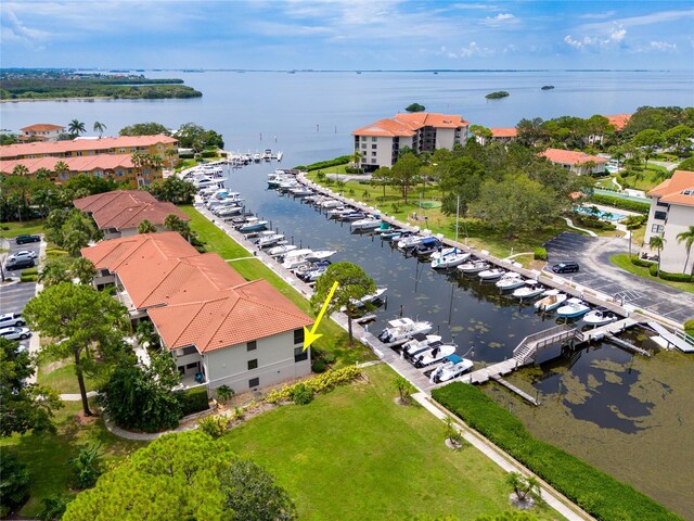 birds eye view of property featuring a water view