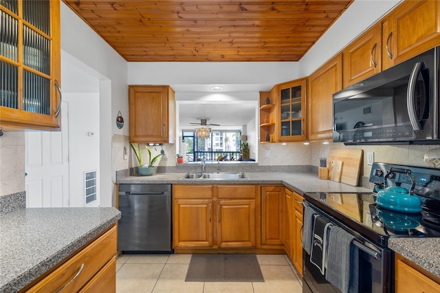 kitchen with ceiling fan, appliances with stainless steel finishes, wooden ceiling, and decorative backsplash