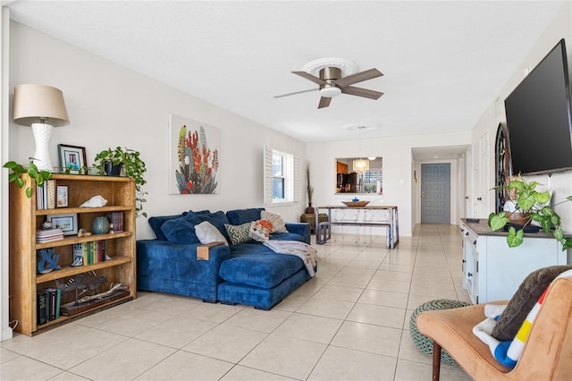 tiled living room featuring ceiling fan