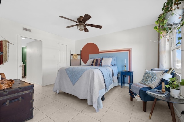 bedroom featuring ceiling fan and light tile patterned floors