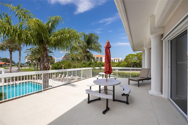 view of patio / terrace featuring a fenced in pool