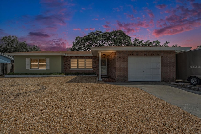 ranch-style home with a garage