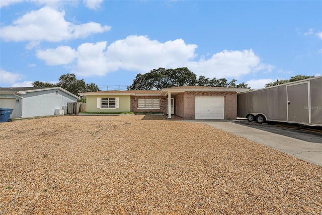 ranch-style home with a garage