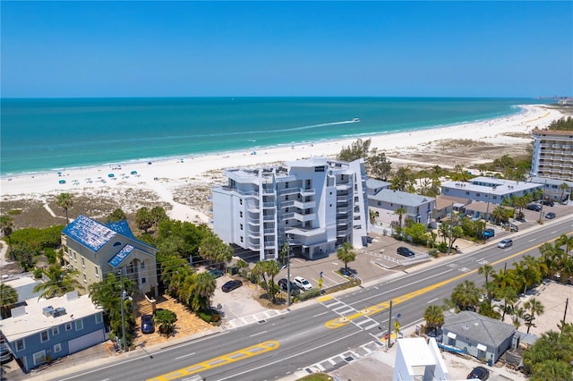 aerial view featuring a water view and a view of the beach