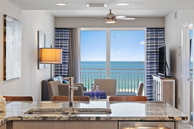 dining space featuring ceiling fan