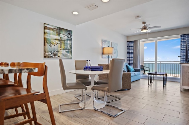 dining room with ceiling fan