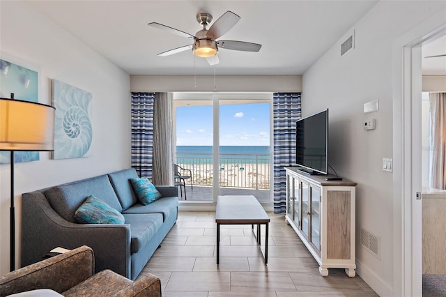 living room with ceiling fan