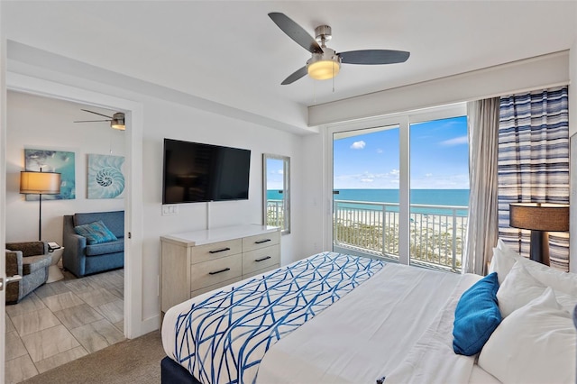 bedroom featuring ceiling fan and access to outside