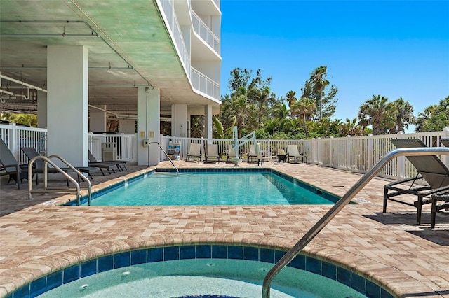 view of swimming pool with a patio area