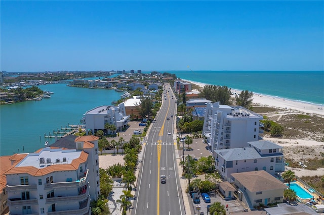 drone / aerial view with a water view and a view of the beach