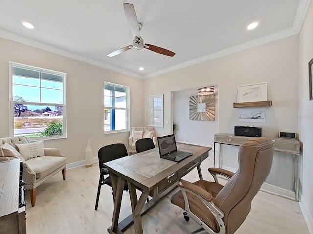 office with light hardwood / wood-style floors, ornamental molding, and ceiling fan