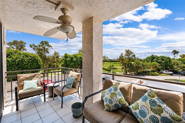 balcony featuring ceiling fan