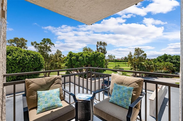 balcony with an outdoor hangout area