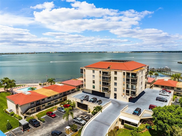 birds eye view of property featuring a water view