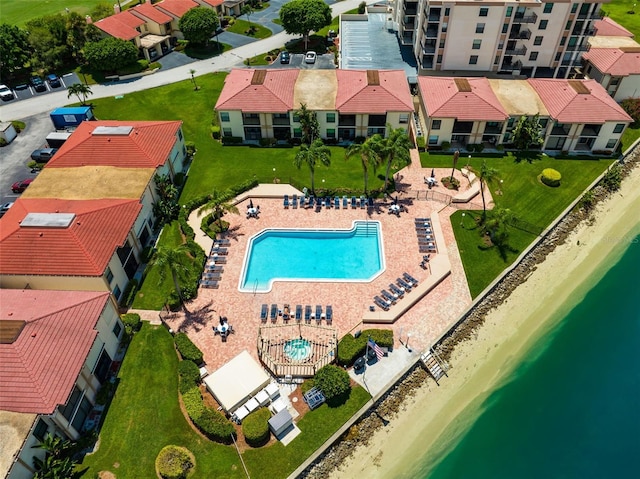 birds eye view of property featuring a water view