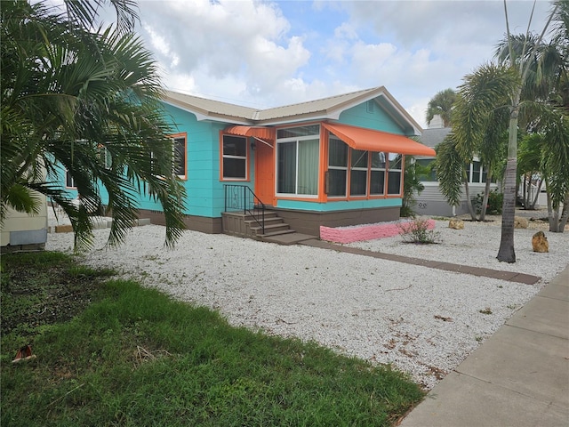 3108 58th St S, Gulfport, FL 33707 - view of front of house featuring metal roof