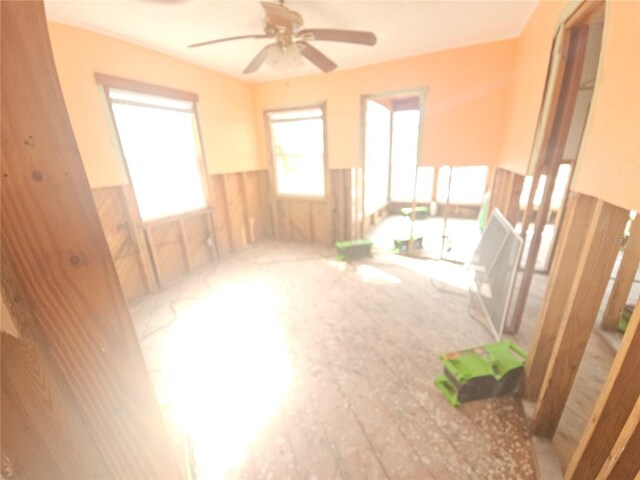 3108 58th St S, Gulfport, FL 33707 - empty room with wainscoting and ceiling fan