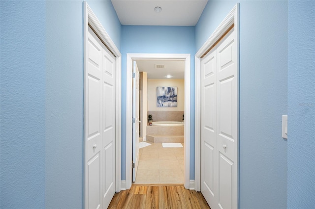 hall featuring hardwood / wood-style flooring