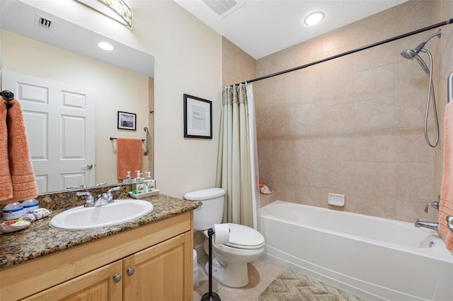 full bathroom featuring tile patterned flooring, vanity, shower / tub combo with curtain, and toilet