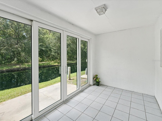 interior space featuring light tile patterned floors and a wealth of natural light