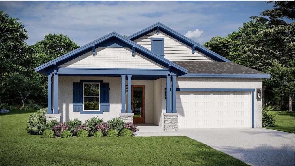 view of front facade with a garage, covered porch, and a front yard