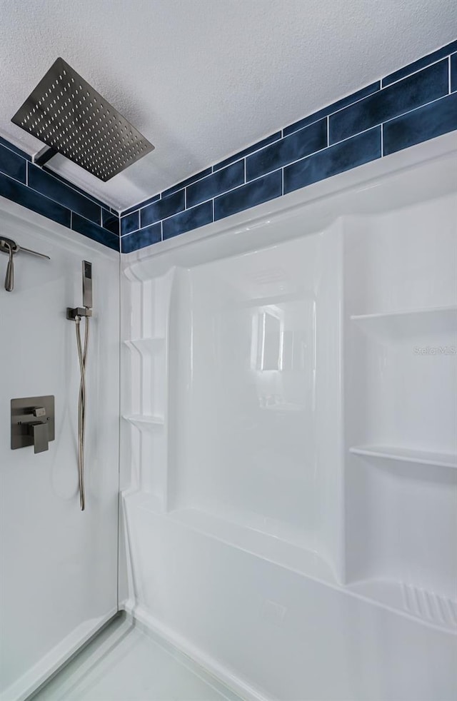 interior space with walk in shower