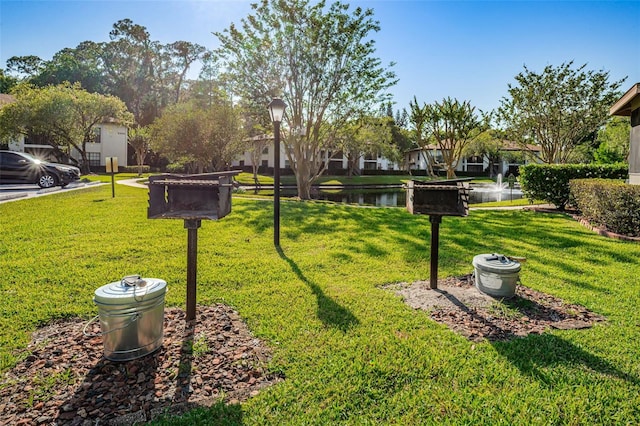 view of yard featuring a water view