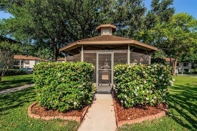 exterior space with a front lawn