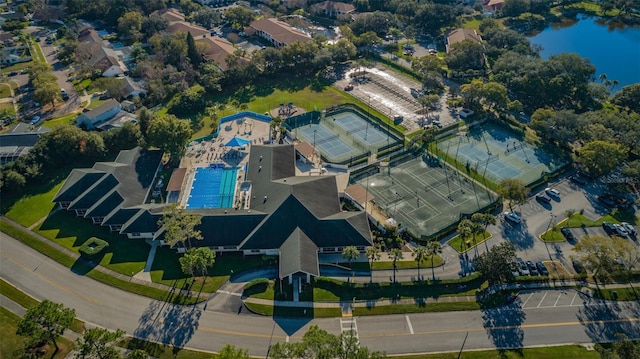 birds eye view of property featuring a water view