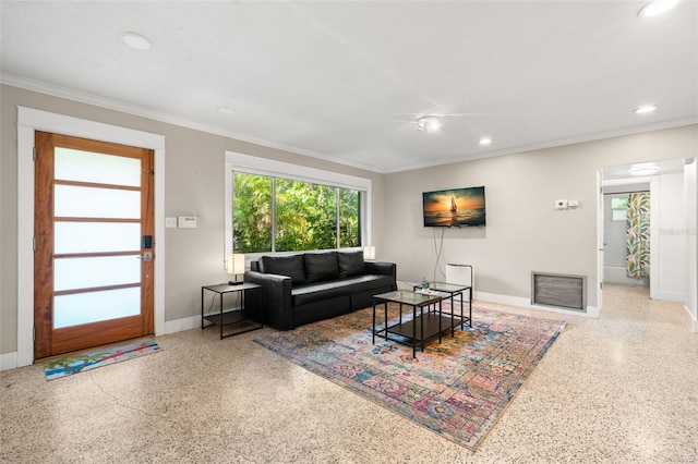 living room with ornamental molding