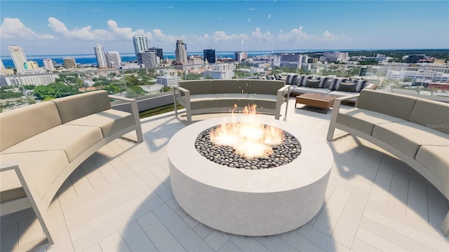 view of patio / terrace featuring an outdoor living space with a fire pit