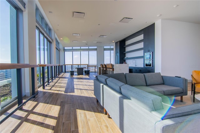 building lobby featuring visible vents and a sink