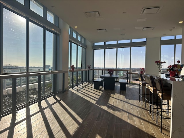 sunroom / solarium featuring visible vents