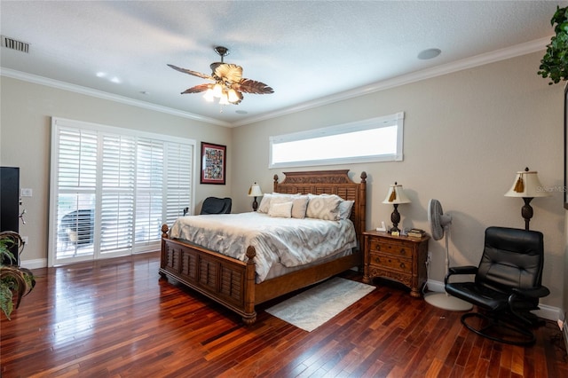 bedroom with ornamental molding, dark hardwood / wood-style flooring, ceiling fan, and a textured ceiling