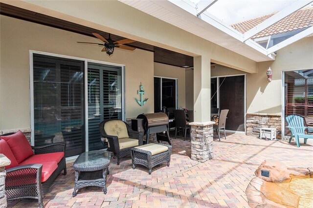 view of patio featuring outdoor lounge area and ceiling fan