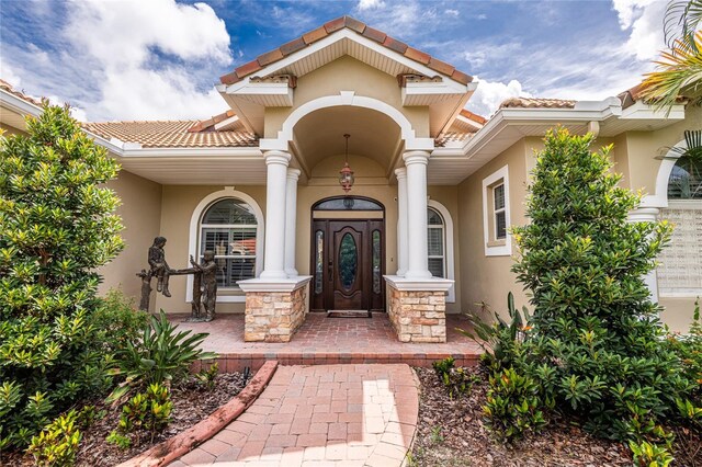 property entrance featuring french doors